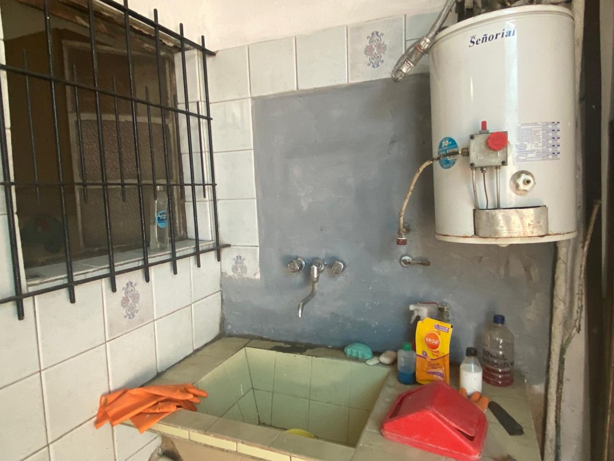 venta oportunidad casa con local en Adolfo Sourdeaux